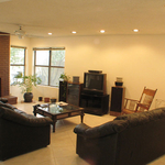 open living room with brick fireplace
