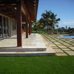 quartzite set in grass, limestone deck