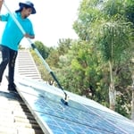 DI water through a water-fed-pole