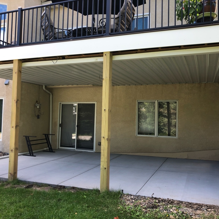Deck with steel Rain diversion system underneath