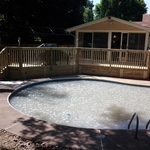 In ground pool with deck and diving board