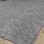 Herringbone pattern concrete bricks