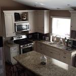 new cabinets, granite, wood floor
