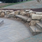 Boulder wall with built in benches