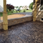 weathered and stained cobblestone patio