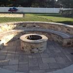 Recessed fire pit with seating.
