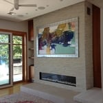 90" TV behind wall art