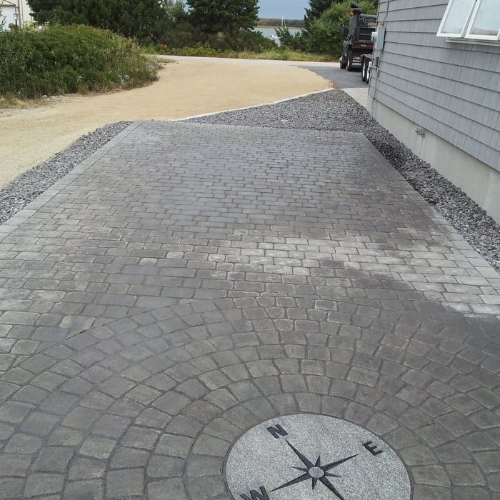Cobblestone patio with medalion