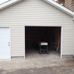 New garage door installation on detached garage