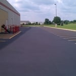 Commercial Parking Lot Sealcoated and Striped