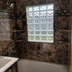 Paradisio with accent strip and glass block window