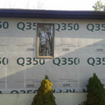 Fanfold wrap of house exterior before siding