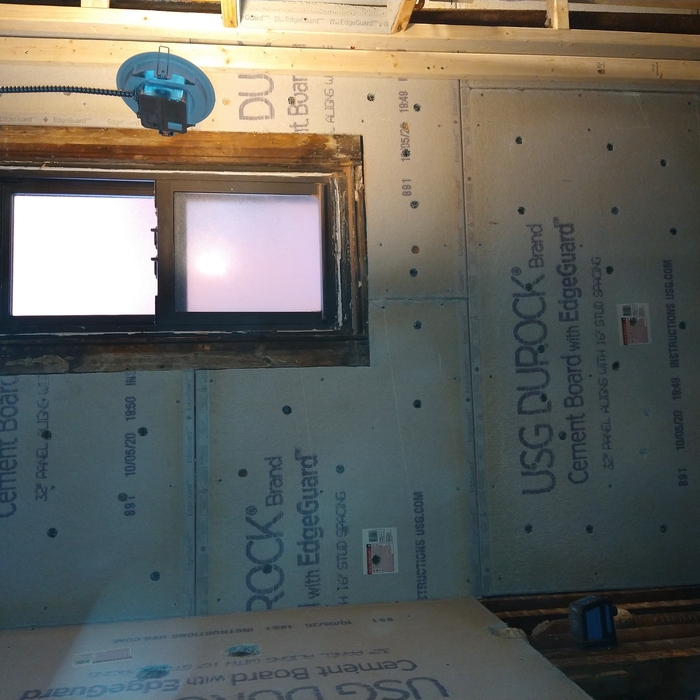 cement board in the bathrooms wall