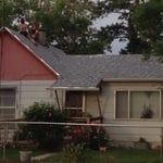Finishing the ridge and shingle job