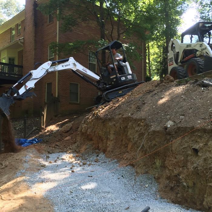 Installing the footing for the new retaining wall