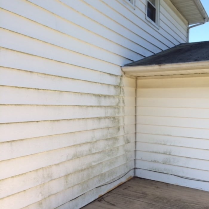 Here back corner of house and deck