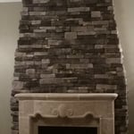 Stone fireplace and surround