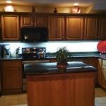 beutifull kitchen with an island.