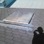 Prior to roof removal. Old skylight replacement.