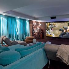 Eclectic Home Theater with lounge style sectional