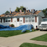 Roofing - During with tarp protection