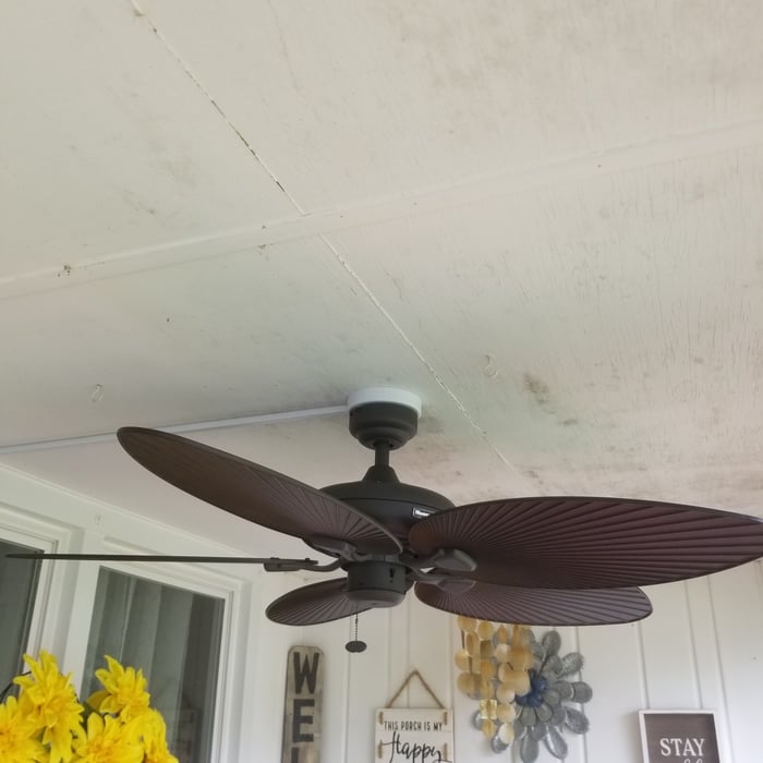 Installed ceiling fan on porch.