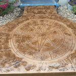 roman slate texture with compass design