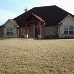 MIX STUCCO, CEDAR, STONE, BRICK.....NICE.