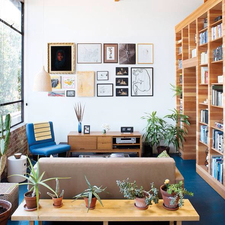 Contemporary Library with mid-century modern love seat