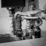 Man Repairing Heating System