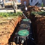 Septic tank and sewer line installed.