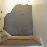 Plaster repair. Later was painted.