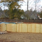 Privacy with scalloped arch and post caps