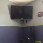 TV Mounted In Corner With Wires Concealed
