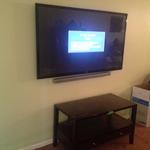 TV Mounted On Wall With Wires Concealed + SoundBar