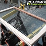 Casement window sash in process of repair