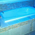 Jacuzzi tub with mosaic tile surround