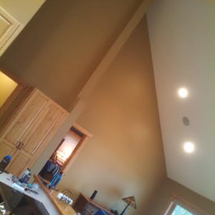 Family room repaint with modern accents