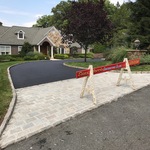 Asphalt driveway with belgian block apron