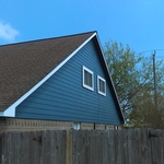 Gable end finished Hardie plank siding & paint