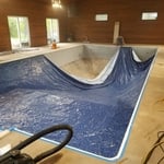 New vinyl liner is hung