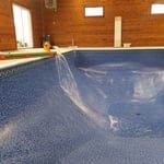 Liner is vacuumed and water being filled