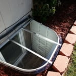 Egress window with low profile cover