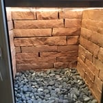 custom strip stone area well