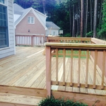 beautiful new light wood wrap around deck