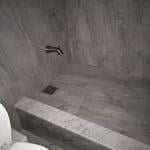Marble tile shower floor and walls