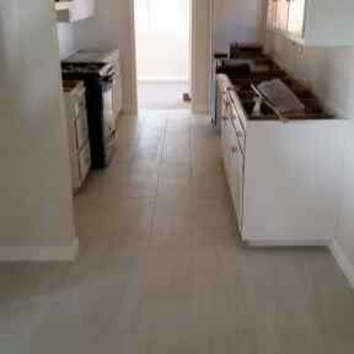 kitchen cabinets and tile flooring