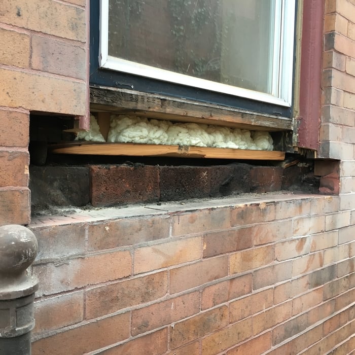 Sandstone sill removed