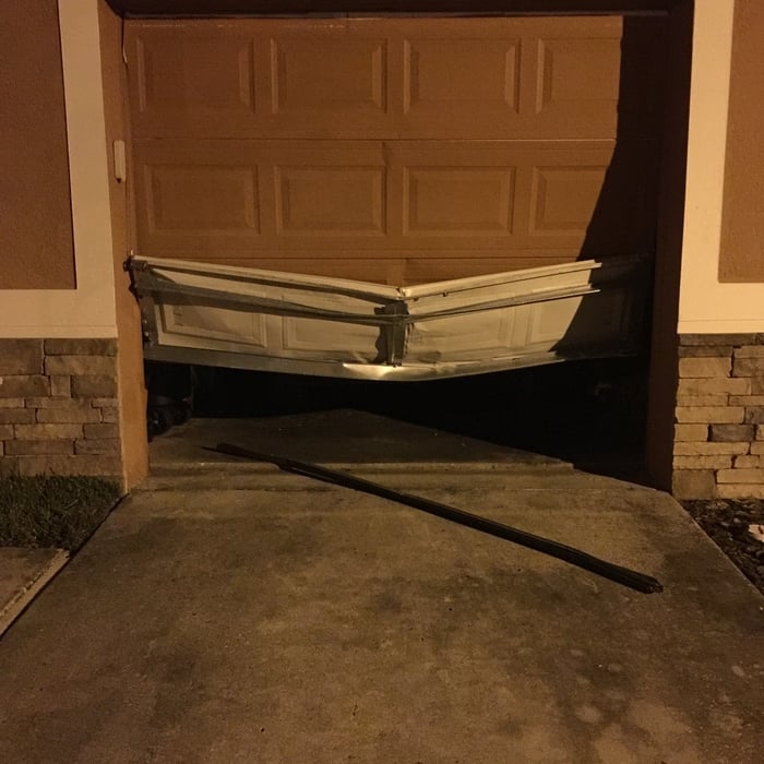 Car through door
