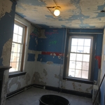 Frat room after loose plaster removal